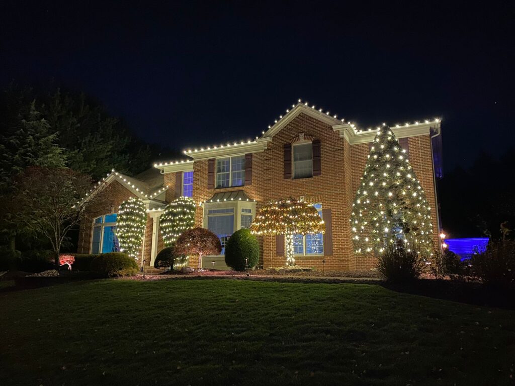 Christmas light installation Basking Ridge NJ — rooflines and greenery